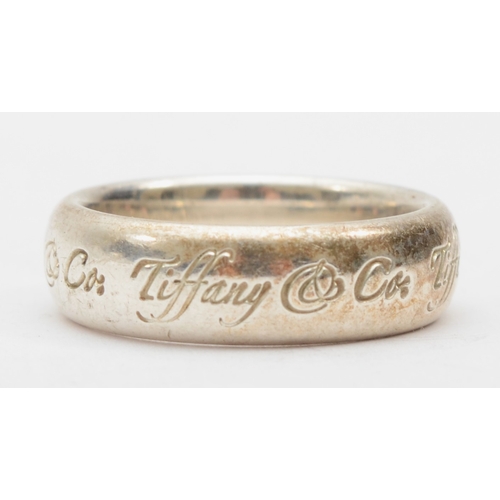 190 - Tiffany & Co, a silver ring, M-N, 7gm.