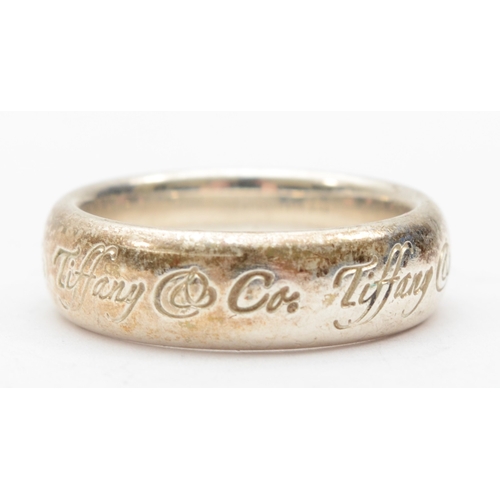 190 - Tiffany & Co, a silver ring, M-N, 7gm.