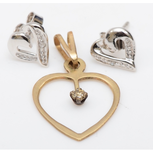 209 - A pair of white gold eight cut diamond stud earrings, 7mm, together with a 9ct gold heart pendant, 1... 