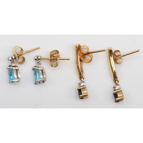 211 - A pair of 375 gold topaz drop stud earrings, 9mm, and a sapphire pair, 2.4gm.