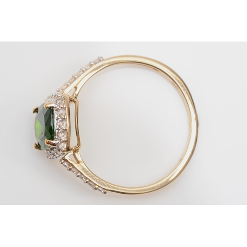 216 - A 9ct gold diopside and white sapphire dress ring, S, 2.7gm.