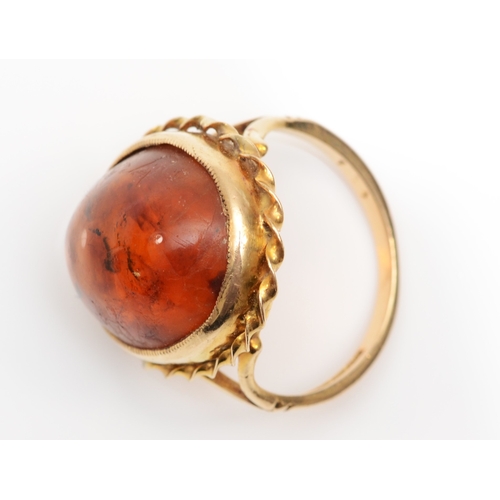 217 - A 9ct gold Baltic amber dress ring, 21 x 17mm, N, 6.2gm.