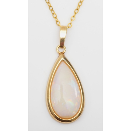 222 - A 9ct gold opal pendant on chain, 15 x 8mm, 2.2gm.