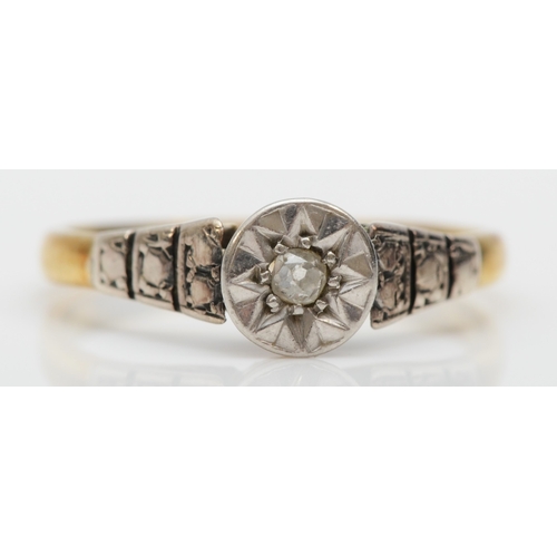 226 - An 18ct gold illusion set diamond solitaire ring, M, 2.1gm.