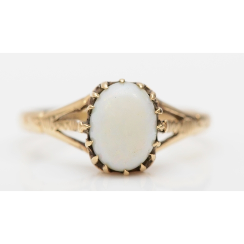 231 - A 9ct gold opal dress ring, K, 1.6gm.