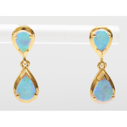 233 - A pair of 18k gold crystal opal drop earrings, 20mm, 3.1gm, lacking backs.