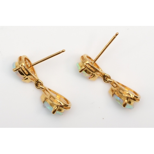 233 - A pair of 18k gold crystal opal drop earrings, 20mm, 3.1gm, lacking backs.