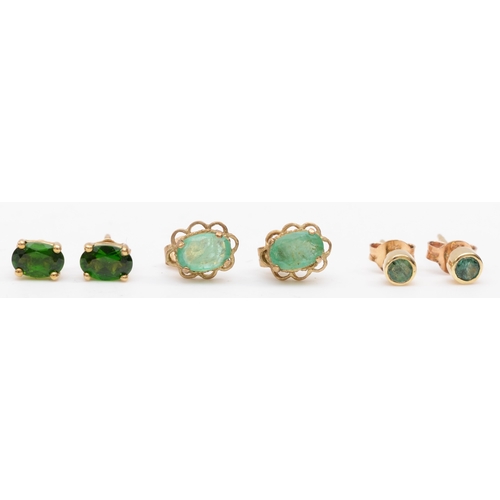 240 - An unmarked gold pair of emerald stud earrings, 8 x 6mm, and two pairs of gold diopside studs, 2.3gm... 