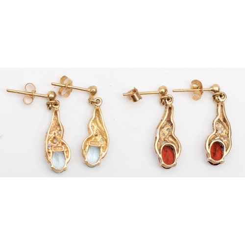 241 - A pair of 375 gold topaz drop earrings, 17mm, togther with an unmarked gold garnet pair, 3.3gm.