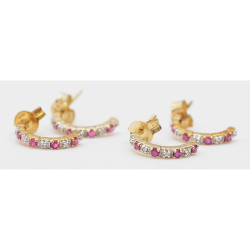 242 - Two pairs of 9ct gold ruby and diamond half hoop earrings, 12mm, 2.2gm.