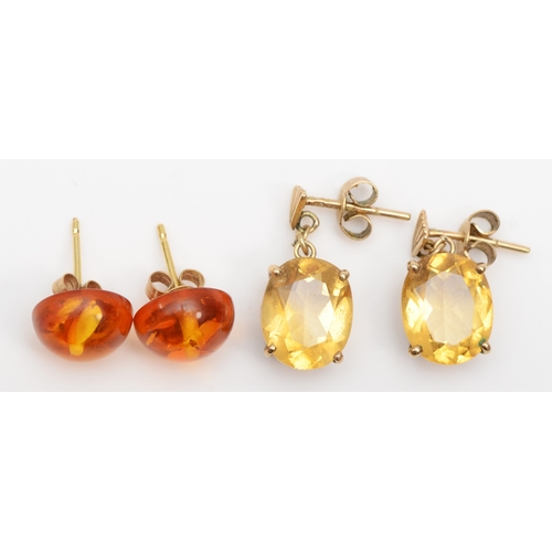 243 - A pair of 9ct gold citrine drop earrings, 18 x 9mm, together with a pair of Baltic amber stud earrin... 