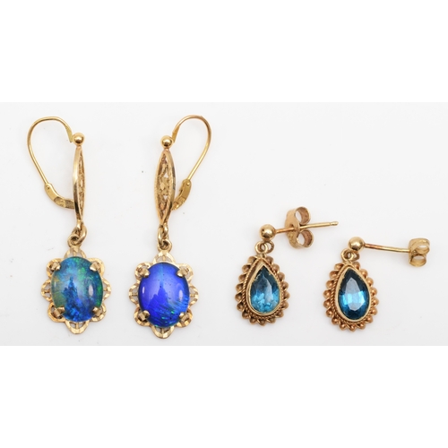 244 - A pair of 375 gold ammolite triplet drop earrings, 34mm, together with a pair of 9ct gold topaz earr... 