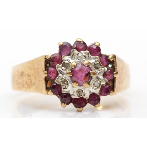 251 - A 9ct gold ruby and diamond cluster ring, P-Q, 3.8gm.