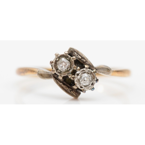 263 - An 18ct gold and platinum set two stone old cut diamond dress ring, N, 2.1gm.