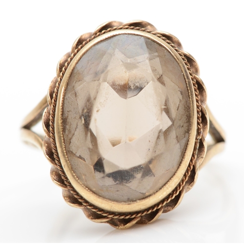 266 - A 9ct gold smokey quartz dress ring, 16 x 12mm, N-O, 5gm.