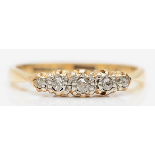 267 - An 18ct gold and platinum set five stone old cut diamond ring, M, 2.3gm.