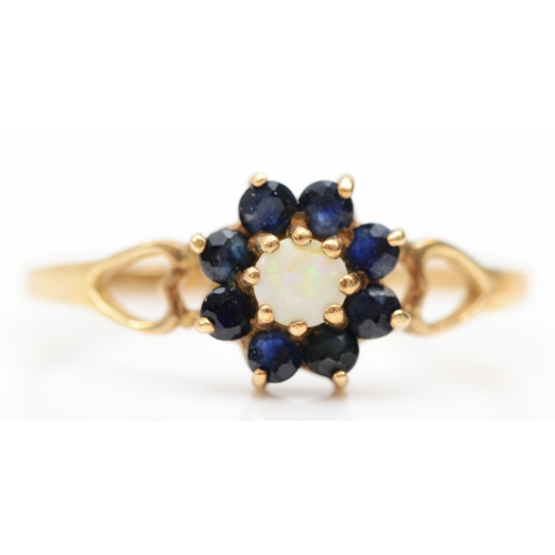 271 - A 9ct gold opal and sapphire floral cluster ring, N, 1.1gm.