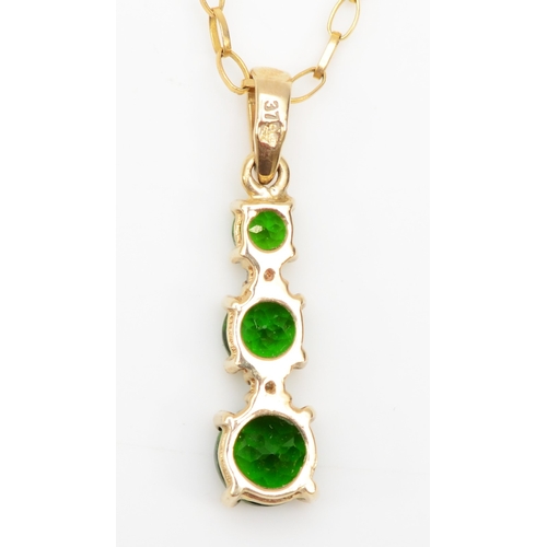 273 - A 9ct gold diopside and diamond pendant on chain, 21mm, 1.8gm.