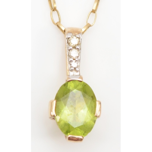 277 - An unmarked gold peridot and diamond pendant on chain, 16 x 7mm, 2gm.