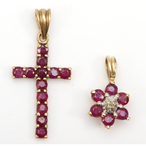 280 - A 9ct gold ruby cross pendant, 24 x 11mm, together with an unmarked gold ruby and diamond cluster pe... 