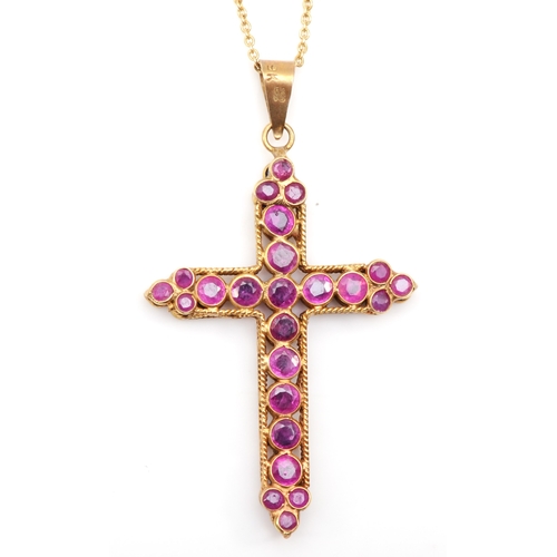 287 - A 9ct gold synthetic ruby and sapphire cross pendant, 34 x 22mm, on chain, 2.5gm.