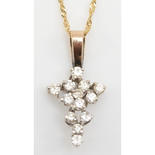 292 - A unmarked gold brilliant cut diamond cluster pendant, on chain, 24 x 12mm, 2.6gm.