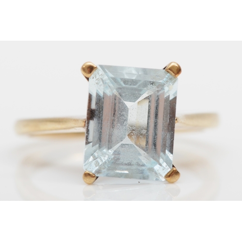 295 - A 9ct gold aquamarine cocktail dress ring, 10 x 8mm, M, 3.3gm.