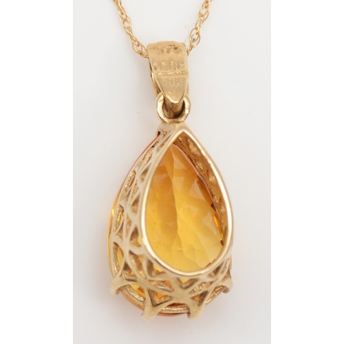 297 - A 9ct gold citrine pendant on chain, 14 x 8mm, 2.1gm.