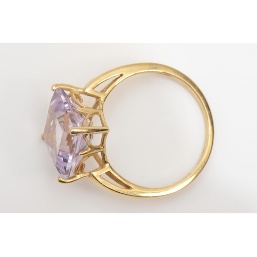 301 - A 9ct gold amethyst dress ring, 11mm, S-T, 3.9gm.