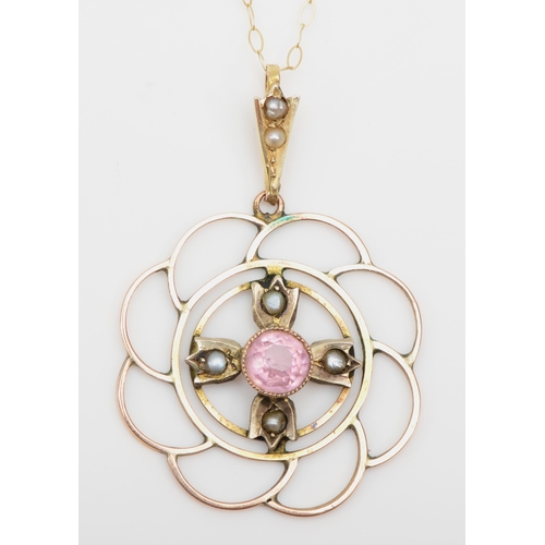 306 - A 9ct gold garnet doublet and seed pearl openwork pendant, on chain, 27mm, 2.8gm.