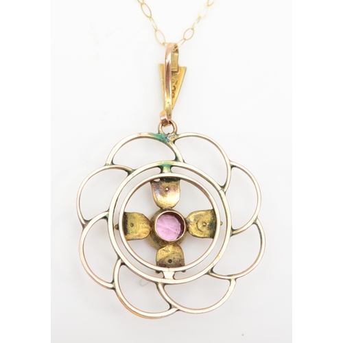 306 - A 9ct gold garnet doublet and seed pearl openwork pendant, on chain, 27mm, 2.8gm.