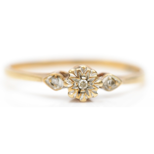 307 - A 9ct gold illusion set diamond ring, N-O, 1gm.