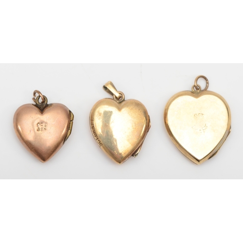 317 - Three 9ct gold front and backed heart shaped lockets, largest 21 x 18mm, 8.4gm.