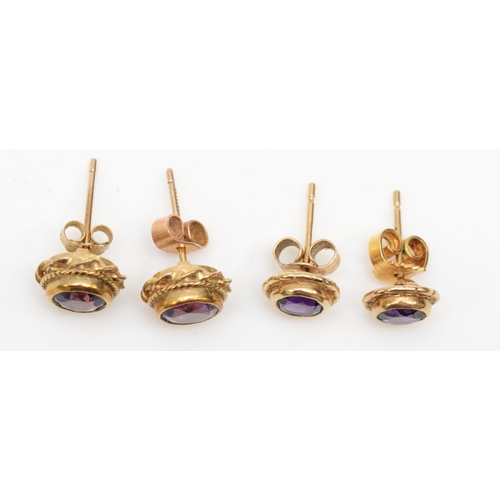 328 - Two pairs of 9ct gold amethyst stud earrings, largest 9mm, 3.6gm.