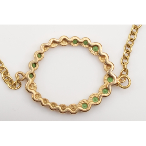 331 - A 375 gold green garnet bracelet, 21cm, 3.8gm.