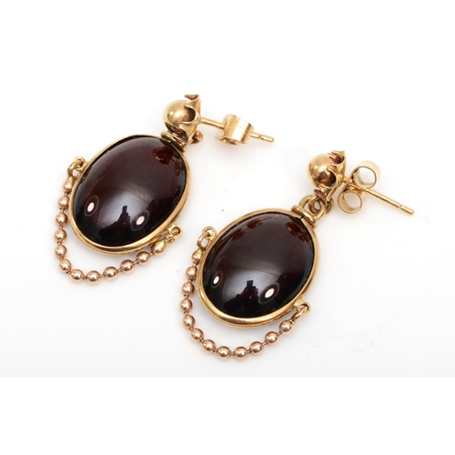 334 - A pair of 9ct gold garnet drop earrings, 25 x 15mm, 5.7gm.