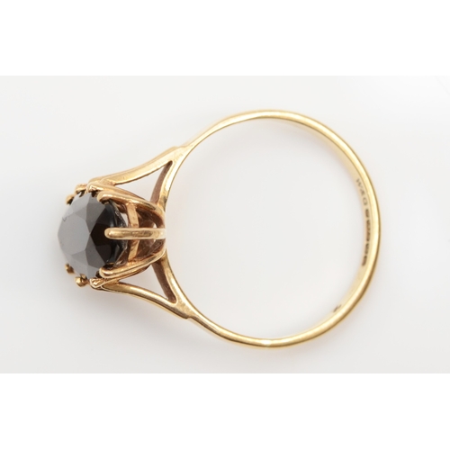 338 - A 9ct gold smokey quartz cocktail dress ring, 15 x 7mm, P, 2.5gm.