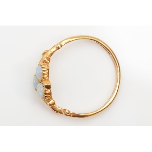 339 - A 9ct gold opal clover dress ring, with scroll decorated setting, N, 1.7gm.