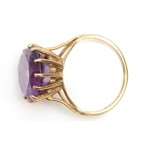 340 - A 9ct gold colour changing synthetic sapphire cocktail dress ring, 14mm, N-O, 5gm.