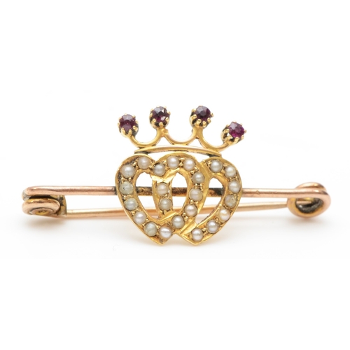 345 - A Scottish unmarked gold ruby and seed pearl luckenbooth brooch, 36 x 16mm, 2.8gm.