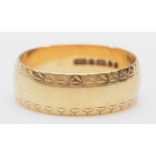 347 - A Gentleman's 9ct gold wedding band, with chevron banded decoration, W, 5.8gm. 

The proceeds of thi... 