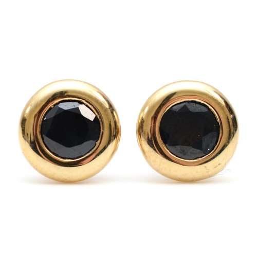 358 - A pair of 9K gold collet set sapphire stud earrings, 7mm, 1.1gm.