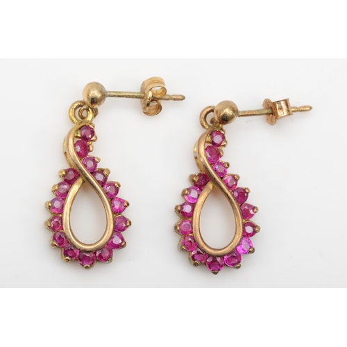 369 - A pair of 9ct gold ruby drop earrings, 23mm, 2.8gm.