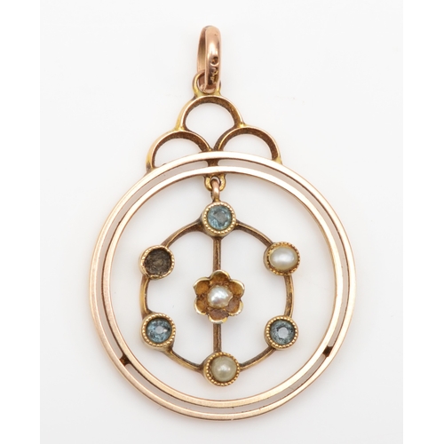 377 - An Edwardian 9ct gold aquamarine and seed pearl open work pendant, 21mm, 2.3gm.