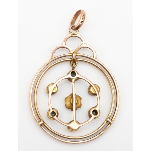 377 - An Edwardian 9ct gold aquamarine and seed pearl open work pendant, 21mm, 2.3gm.