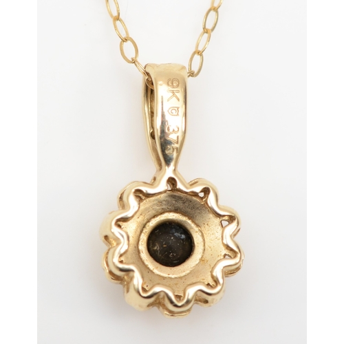 388 - A 9ct gold brilliant cut black diamond pendant, on chain, 16 x 8mm, 1.7gm.