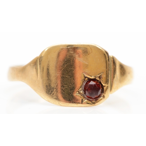 393 - A 9ct gold garnet signet ring, S, 2.1gm.