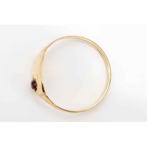 393 - A 9ct gold garnet signet ring, S, 2.1gm.