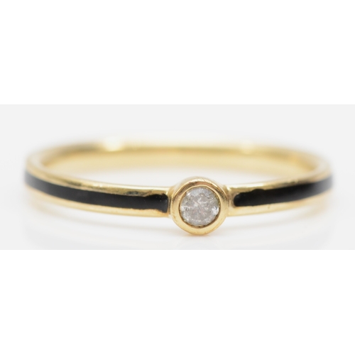 395 - A 9k gold brilliant cut diamond and enamel solitaire ring, K, 0.6gm.