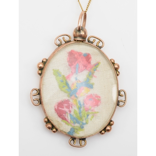 396 - A C. 1900 unmarked gold floral embroidered pendant, on chain , 27 x 39mm, 6.1gm.